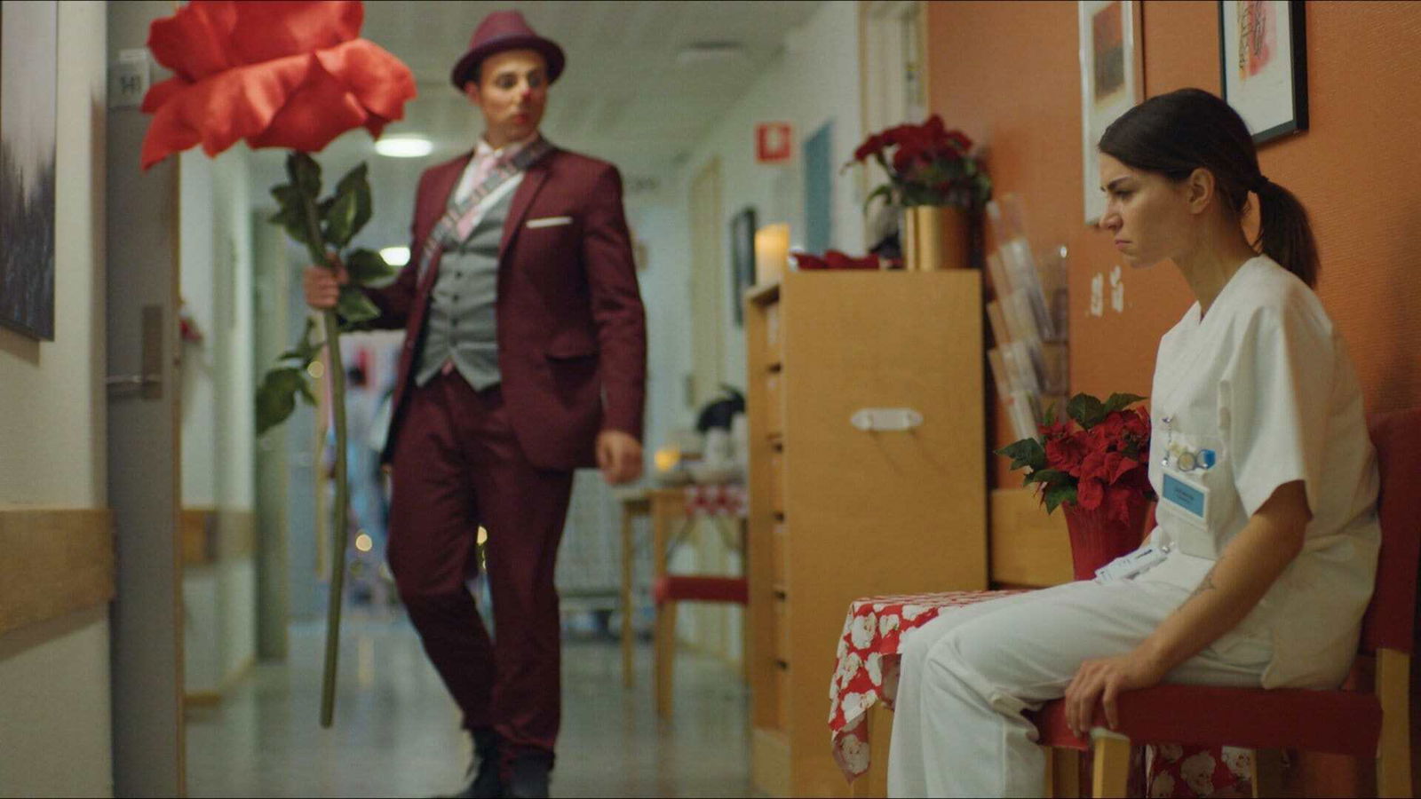 Clicca per vedere l'immagine originale Una scena di Natale con uno sconosciuto