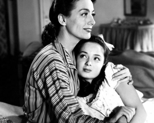 Clicca per vedere l'immagine originale Joan Crawford nei panni di Mildred