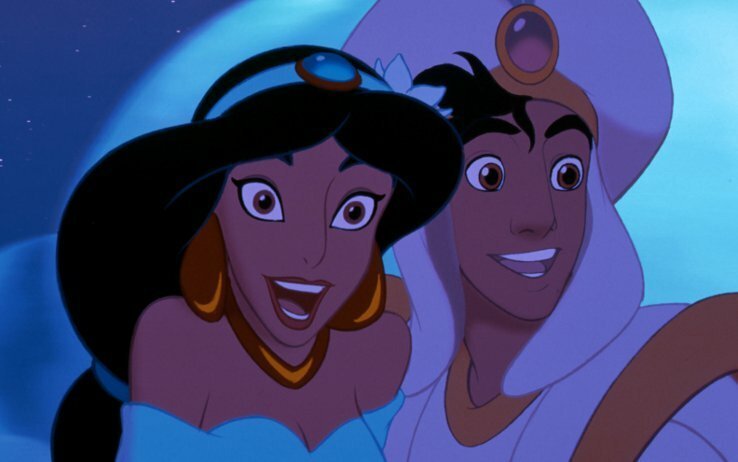Jasmine e Aladdin sorridenti sul tappeto magico