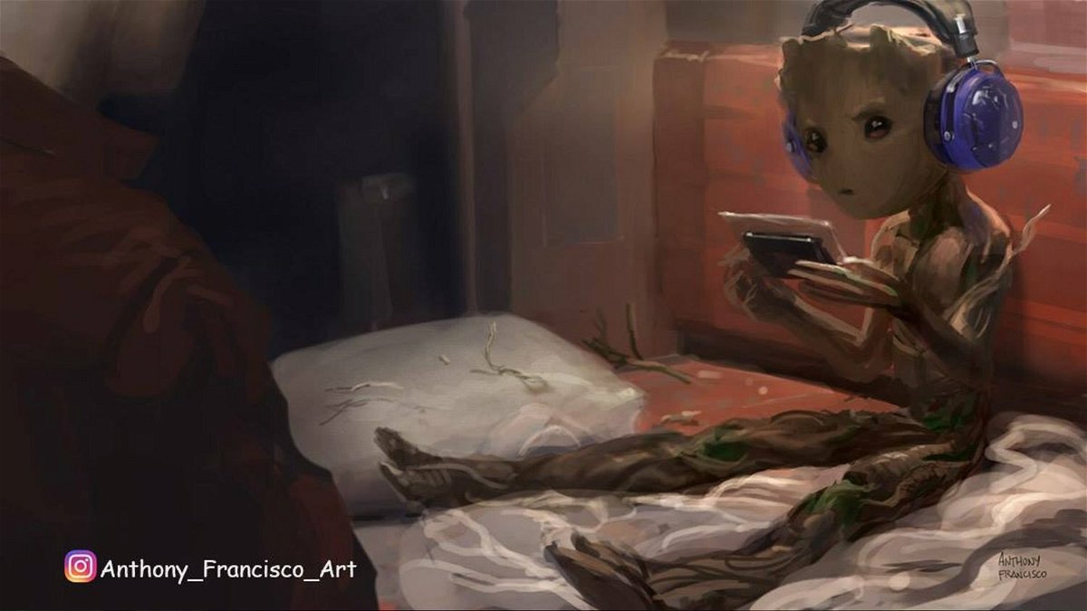 In foto Groot gioca al game-boy mentre guarda Star-Lord