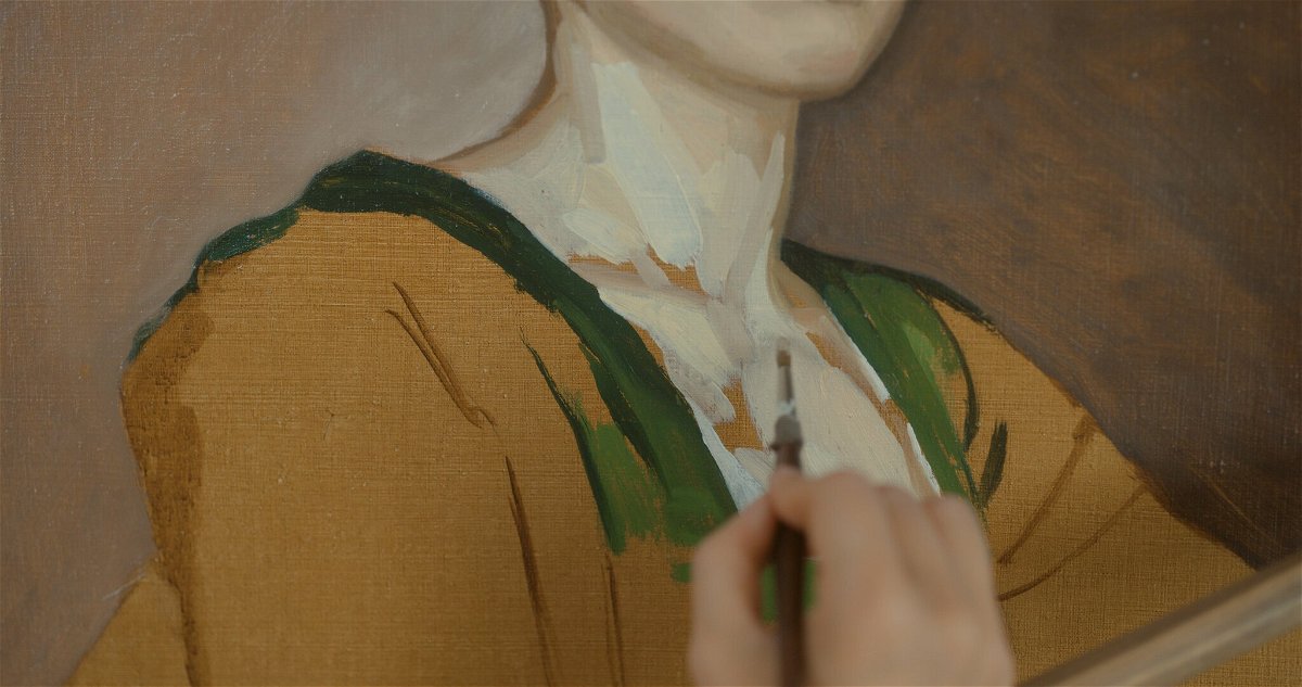 La pittrice dipinge il ritratto