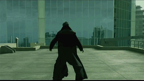 Clicca per vedere l'immagine originale Gif di Neo che schiva le pallottole