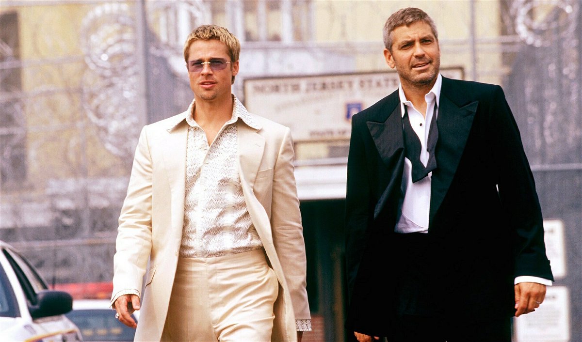 Brad Pitt e George Clooney in una scena del film