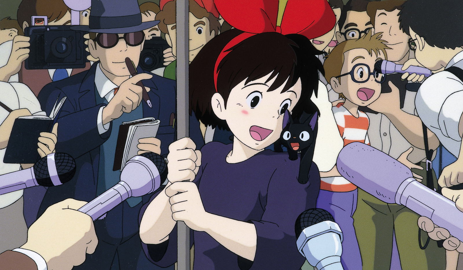 Il miagolio finale di Jiji Kiki accerchiata da giornalisti e il piccolo Jiji miagolante sulla sua spalla