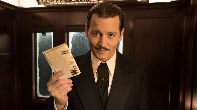 Clicca per vedere l'immagine originale Johnny Depp è Mr. Ratchett in Assassinio sull'Orient Express