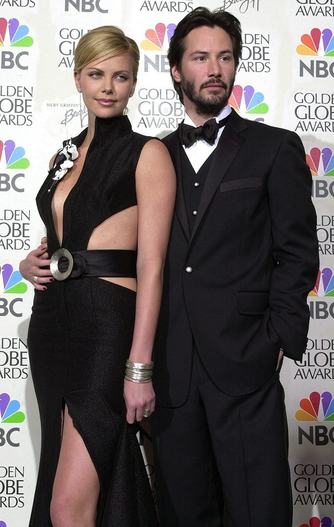 Charlize Theron con Keanu Reeves