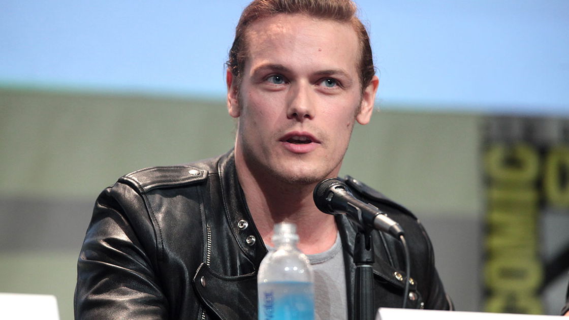Copertina di Sam Heughan sarà Paul Newman nel biopic su Patricia Neal e Roald Dahl