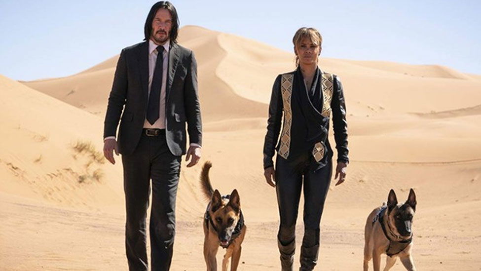 Copertina di John Wick 3: Halle Berry si è rotta 3 costole per stare al passo con Keanu Reeves